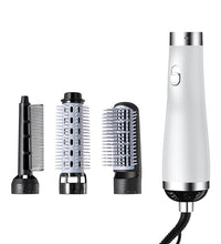 Professional 3-in-1 ionic hair styler and volumizer in premium matte red with interchangeable brush heads.
