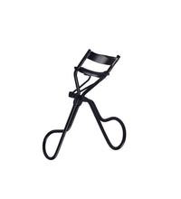 Black eyelash curler on a white background