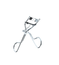 Eyelash curler on a white background