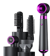 Hair dryer with attachments on a dark background