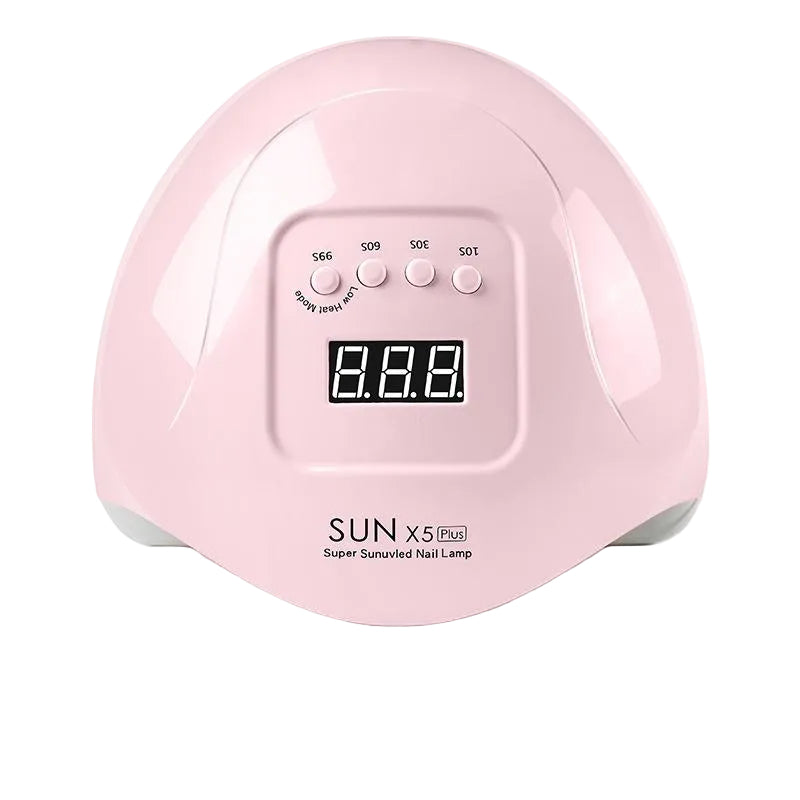 Pink nail lamp with digital display and American plug adapter on a white background