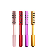 Purple Germanium Beauty Roller with 30 massaging stones for facial contouring and lifting.